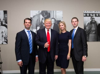 Donald Trump and his family, sons Donald Jnr, Eric and daughter Ivanka are pictured after landing from his personally customised 757 at Shannon Airport.