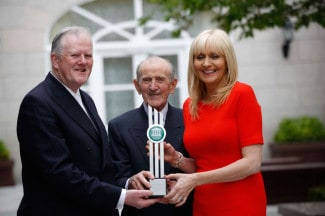 Dr Eamonn G Hall, Solicitor & Notary Public and Chairman of the judging panel of The Irish Law Awards presenting a Lifetime Achievement Award to Maurice Gaffney, SC. Also in the picture in Miriam O’Callaghan, who hosted the awards.