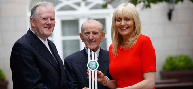 Dr Eamonn G Hall, Solicitor & Notary Public and Chairman of the judging panel of The Irish Law Awards presenting a Lifetime Achievement Award to Maurice Gaffney, SC. Also in the picture in Miriam O’Callaghan, who hosted the awards.