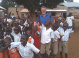Brian O’Neill pictured in Uganda in July 2014 with the charity Lesson for Life