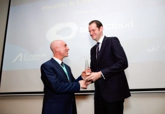 Mark Kennedy, Irish Life Health, presenting Ken Cahill of SilverCloud Health with the Health & Life Sciences Award