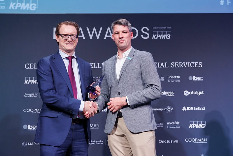 Photographed at the Business & Finance FS Awards 2022: Joe Heneghan collecting the Payments Innovation Award on behalf of Revolut presented by Owen Buckley from UNICEF. Picture Andres Poveda