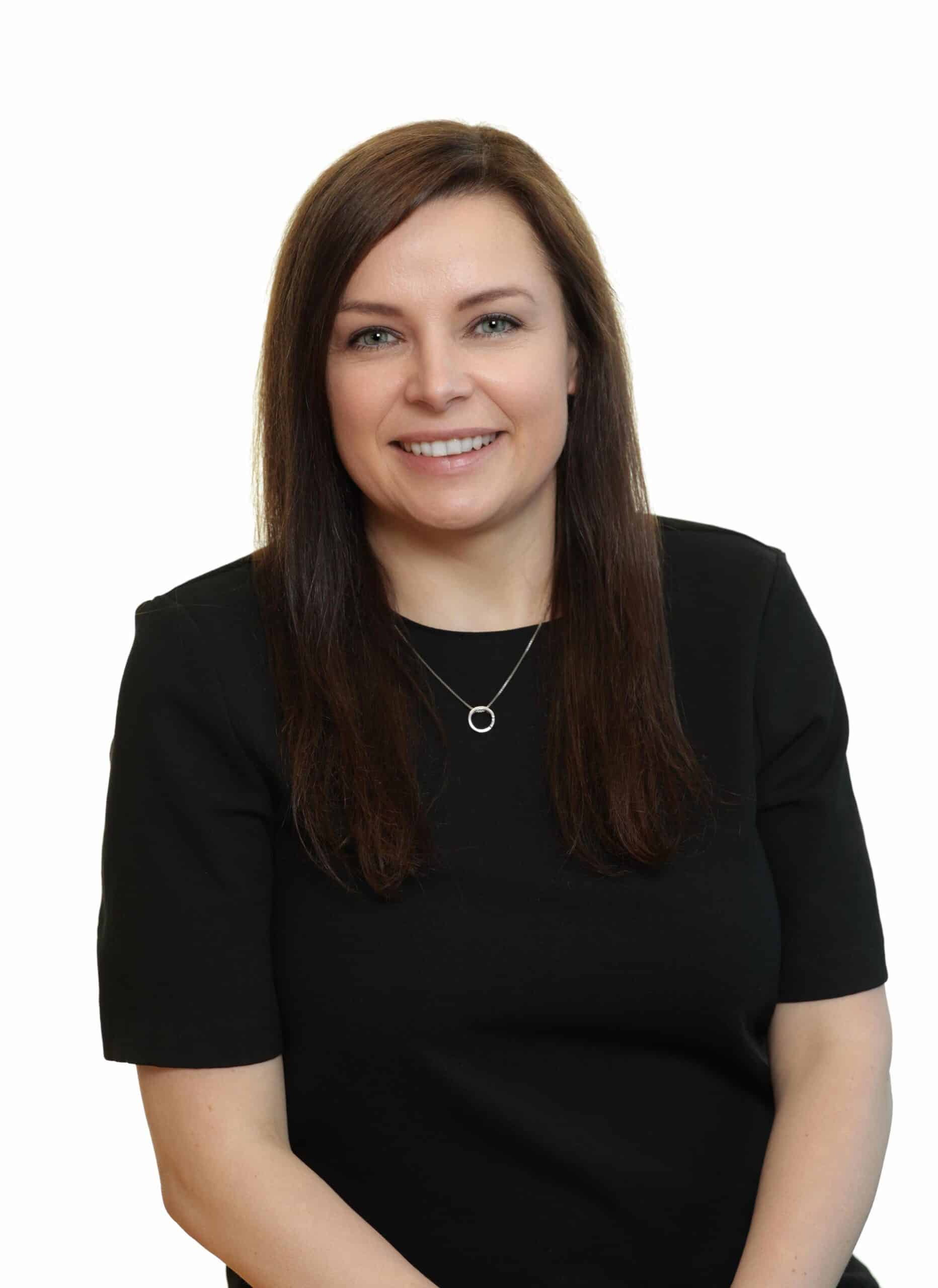 A photo of Justyna Banasik smiling because she is appointed Head of Sustainability in Ireland of Allianz Insurance, one of the country’s largest insurers
