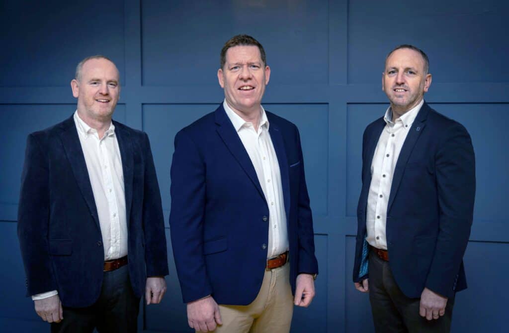 Colin Cleary, newly appointed Managing Director of Niaron Ltd, centered between co-founders and Directors Niall Keane and Ronan Keane.