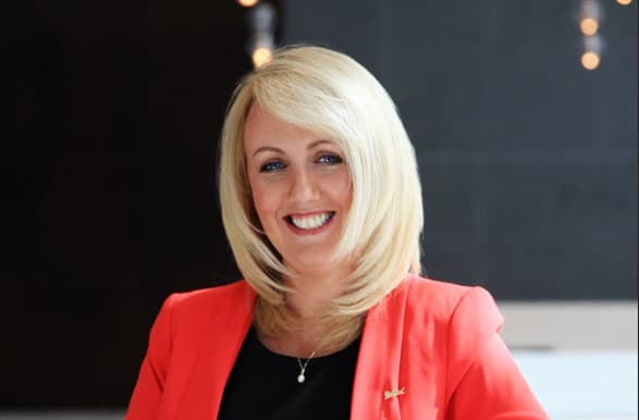 Headshot of Madeline Riley, CEO of Luxor Leisure Ltd and GM of Radisson Blu Royal Hotel, Dublin, smiling