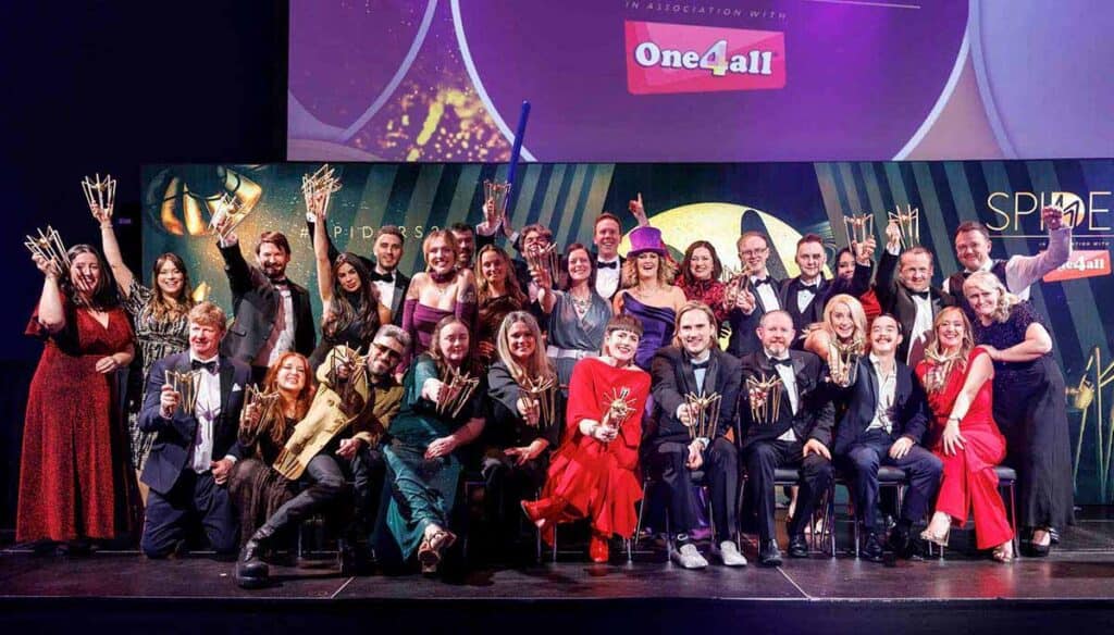 Group of award winners celebrating at the Spider Awards 2026 event.